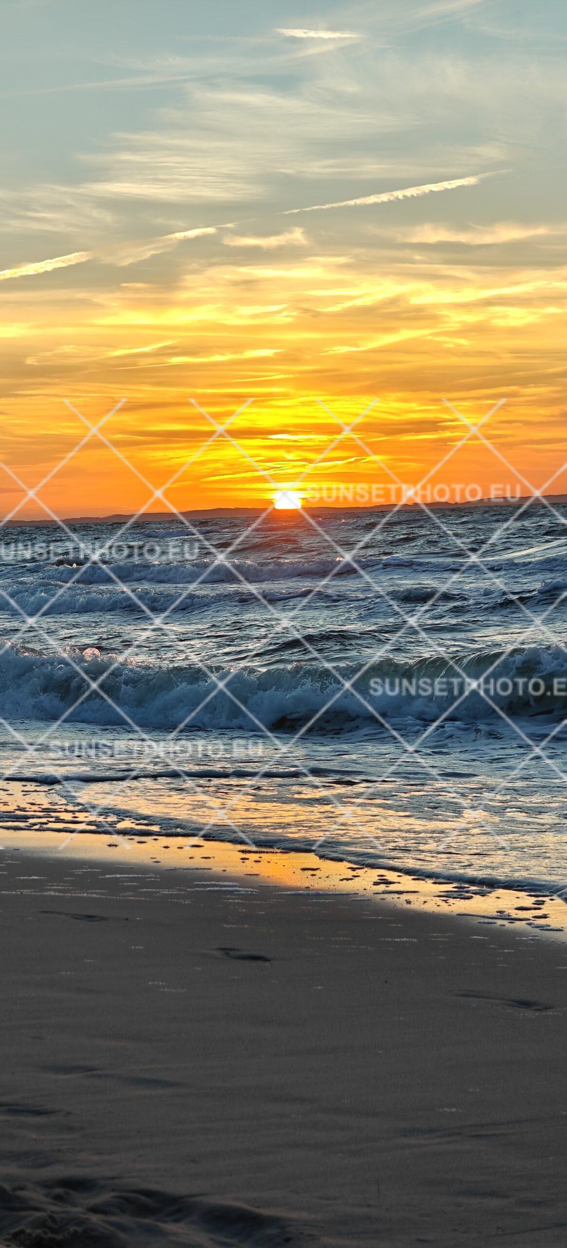 Baltic Sea waves at sunset